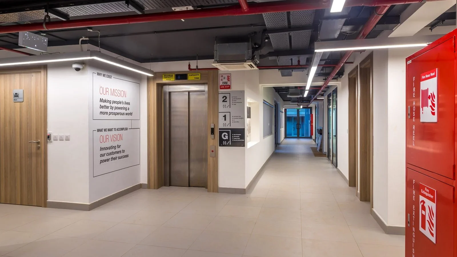 Cummins workplace with installed values graphics, wayfinding and branded walls